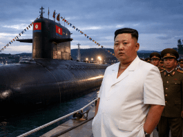 Kim Jong Un unveils nuclear submarine as KCNA warns of retaliatory strikes