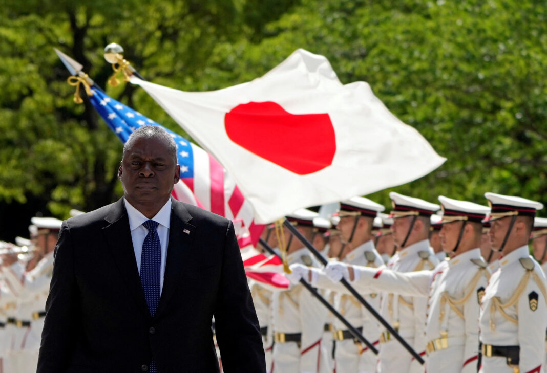 Austin's Japan Mission: Boosting Military Power!