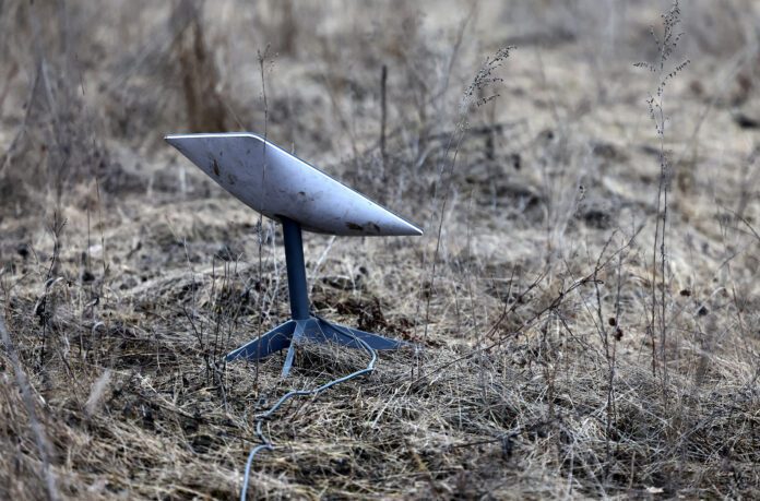 FILE PHOTO: A Starlink satellite internet system is set up near the frontline town of Bakhmut Starlink Under Siege: Russia Targets Ukrainian Networks