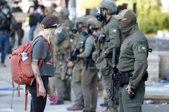 Hundreds protest outside ICE building in Portland after Trump orders troop deployment