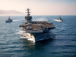 US moves carrier group near Iran as Tehran warns of escalation, raising global trade concerns