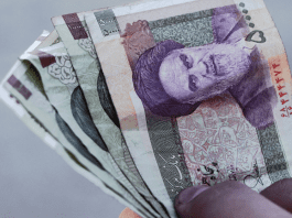 Iran warns of economic strain as revolutionary guard controls key sectors affecting rial stability