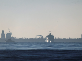 Kremlin official says Russia may deploy navy to protect oil and grain exports amid sanctions