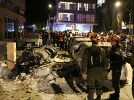 Two killed in Tel Aviv after Iran launches missiles with cluster warheads